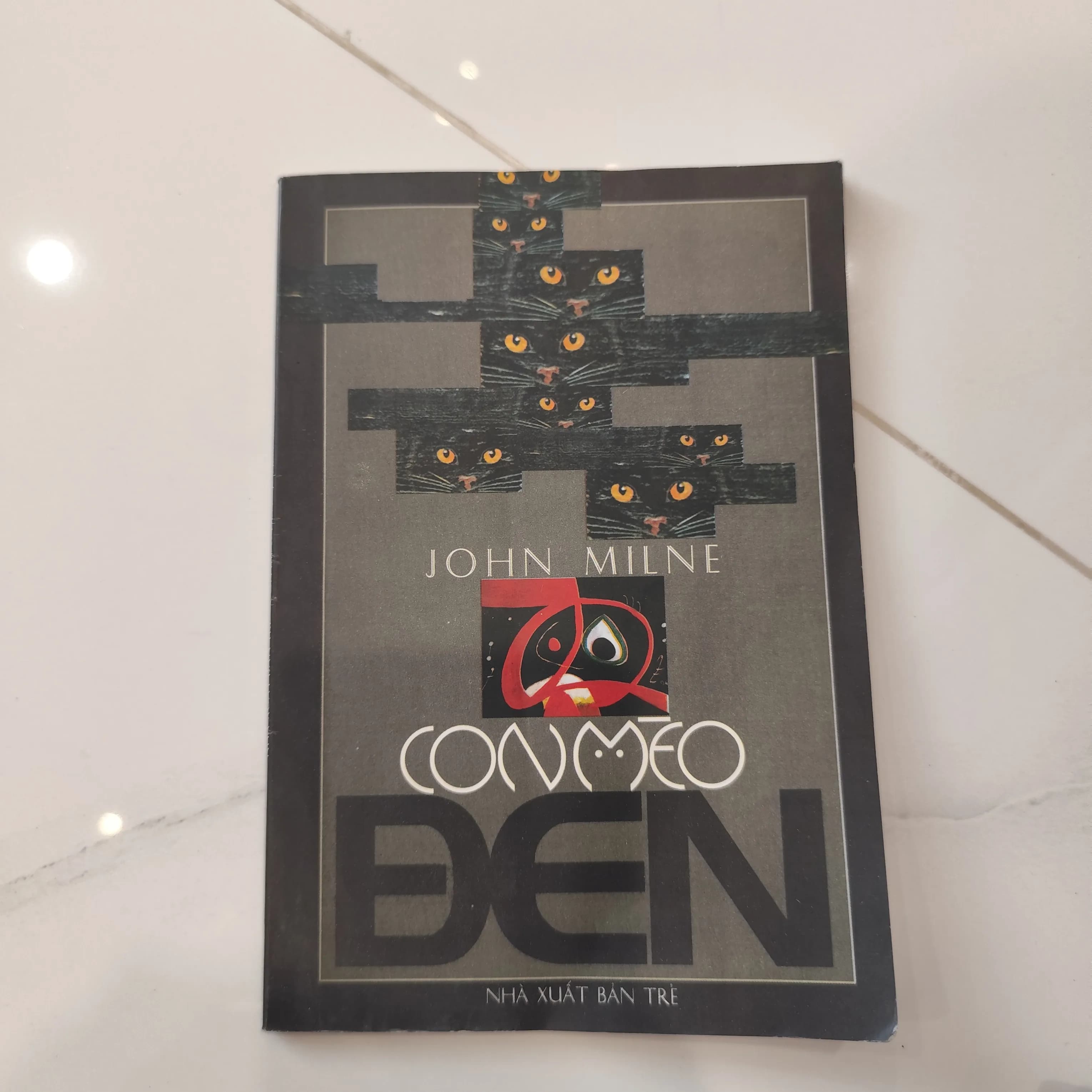 Con mèo đen- John Milne - Image 1