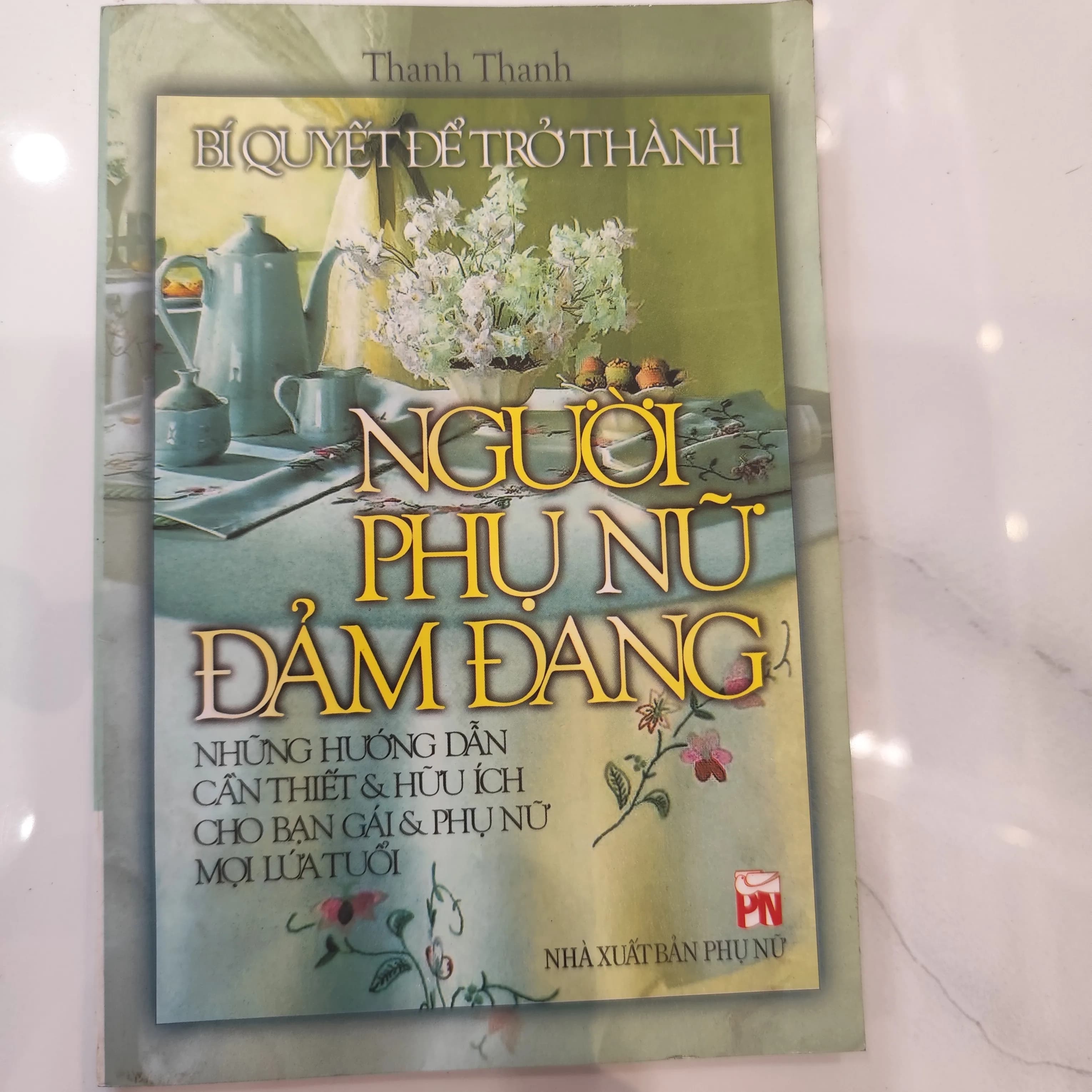 Bí Quyết Để Trở Thành Người Phụ Nữ Đảm Đang" của tác giả Thanh Thanh. - Image 1